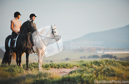 Image of Horse riding, freedom and view with friends in nature on horseback enjoying their hobby during a summer morning. Countryside, equestrian and female riders outdoor together for adventure or bonding