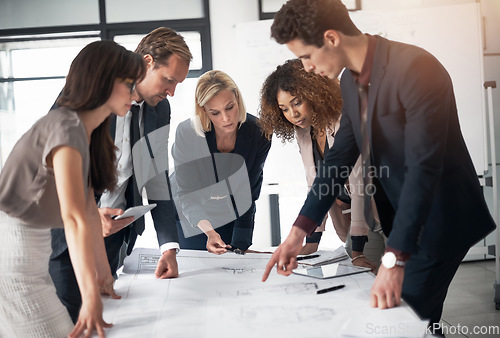 Image of Business people, architect and blueprint layout in meeting collaboration or planning strategy at office. Group of engineers in teamwork discussion, floor plan or documents for industrial architecture