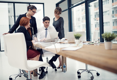 Image of Discussion, meeting and business people in the office planning, brainstorming and doing research. Teamwork, professional and group of designers working on a project in collaboration in the workplace.