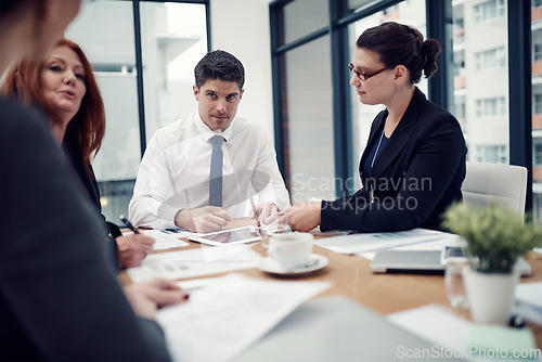 Image of Discussion, brainstorming and business people in meeting in the office for planning with research. Collaboration, teamwork and group of designers working on strategy or project in workplace boardroom