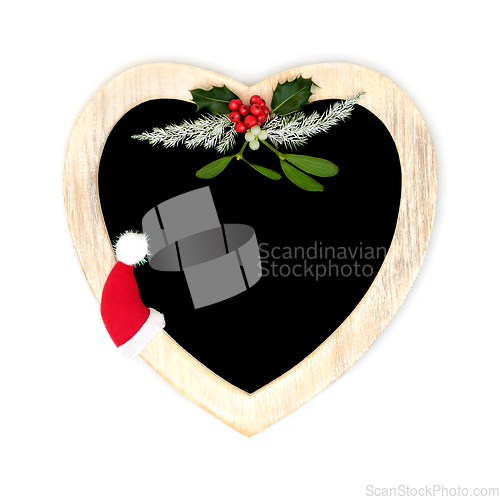 Image of Christmas Heart Shape Wreath and Festive Symbols