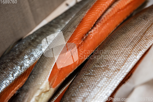 Image of Smoked fish in craft paper box.