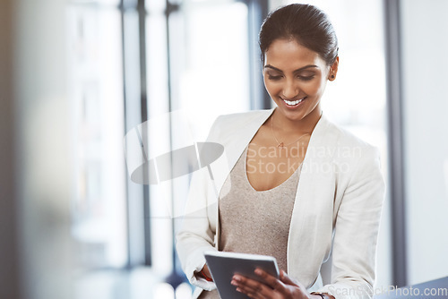 Image of Tablet, accountant and happy woman in office for business, research or online browsing. Smile, digital technology and corporate Indian auditor reading email, internet app or website info in company.