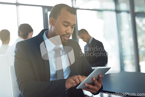 Image of Tablet, accountant and black man in office for business, research or online browsing. Serious, digital technology and corporate African auditor reading email, internet app or website info in company.