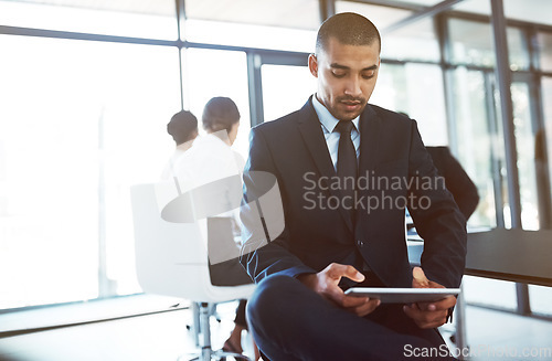 Image of Tablet, accountant and man in office for business, online research or coworking. Serious, digital technology and corporate auditor reading email, internet app or typing to scroll on website mockup.