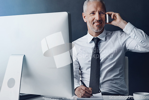 Image of Online communication, mature businessman on a phone call and against studio background with computer at desk, Happy or connectivity, social networking or crm and male person with smartphone planning