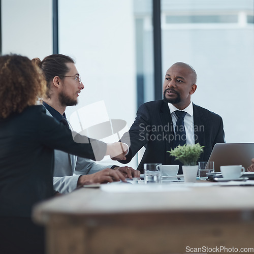 Image of Handshake, meeting and business people or manager partnership, b2b onboarding and thank you, success or deal. Corporate woman, clients or employees shaking hands for thanks, hiring or job negotiation