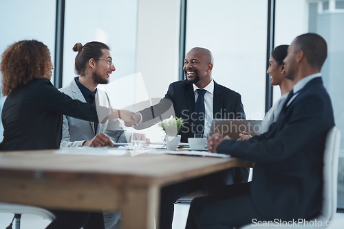 Image of Handshake, clients meeting and business people in partnership, lawyer agreement and thank you, success or deal. Corporate woman, manager or employees shaking hands for thanks, negotiation or law firm