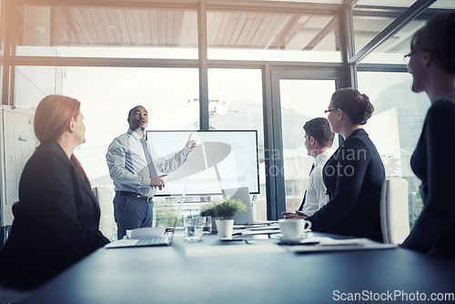 Image of Presentation, speaker or business people in a meeting for graphs report or chart analysis in a company. Data analytics, manager or mentor planning a growth strategy on screen in corporate training