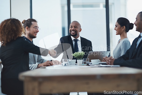 Image of Hand shake, business meeting and people or manager partnership, lawyer agreement and thank you, success or deal. Corporate woman, clients or employees shaking hands in thanks, negotiation or law firm