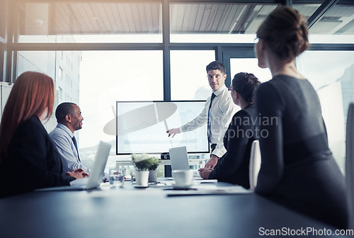 Image of Presentation, businessman or speaker in a meeting for graphs report or chart analysis in a company. Data analytics, manager or mentor planning a growth strategy on screen in corporate office training