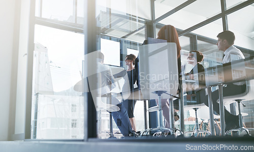 Image of Coaching, teaching or business people in presentation for sales report or financial analysis in office. Education, leadership or manager planning in a meeting on screen monitor in mentorship training