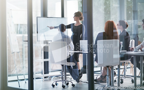 Image of Woman pointing, teaching or business people in presentation for sales report or data analysis. Education, leadership or manager planning strategy on screen monitor in mentorship training or meeting