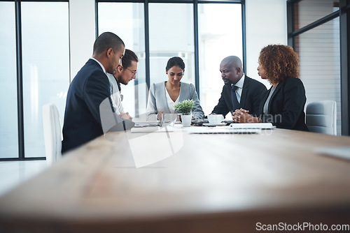 Image of Team, group and staff in a meeting, finance and investments with support, project feedback or negotiation. Business people, collaboration or men with women, budget planning or review financial report