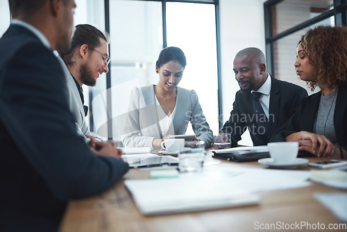 Image of Business people, tablet and staff in a meeting, teamwork and investment with budget report, planning and finance project. Team, trading and group with online reading, stock market and negotiation