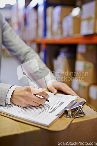 Image of Hands, signature and clipboard with documents in warehouse, logistics and export in supply chain factory. Delivery, ecommerce and person sign distribution paperwork, shipping wholesale and invoice