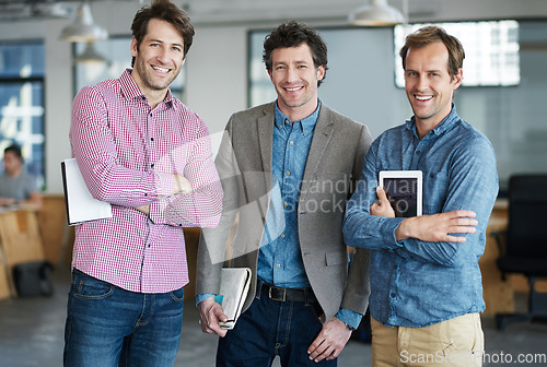 Image of Confident team, portrait or business developers in meeting for brainstorming together in office with smile. Proud people, tablet or happy programmers with technology, notes or notebook in workplace