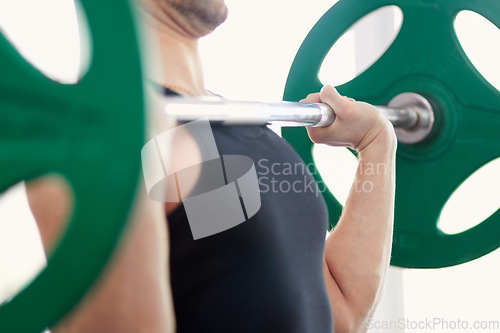 Image of Man, hands and arm weightlifting in a gym with athlete wellness and healthy from workout. Fitness, bodybuilder and male person with weights power from strong muscle and training at health club