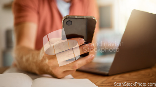 Image of Man, hands and phone for social media, communication or networking in online chatting on table at home. Closeup hand of male person typing, browsing or texting on mobile smartphone app at the house