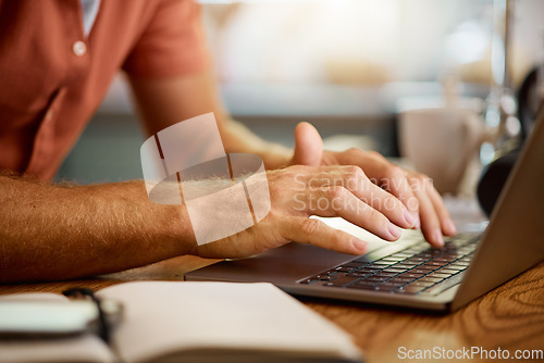 Image of Man, hands and typing on laptop for email, communication or networking in research on table at home. Closeup hand of male person working on computer for online browsing, chatting or texting in house