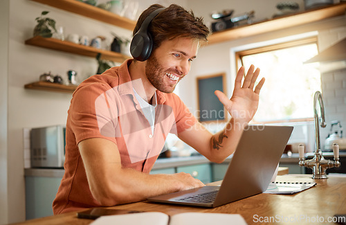 Image of Wave, laptop and video call with man in kitchen for online meeting, remote work and virtual communication. Happy, hello and social media with person at home for technology, streaming and entrepreneur