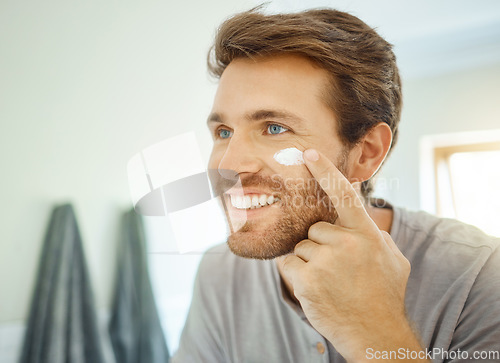 Image of Bathroom, skincare cream or face of happy man with sunscreen, lotion or collagen moisturizer for skin hydration. Facial cosmetics, cosmetology or home person smile during morning ointment application