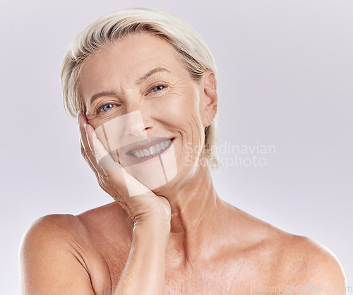 Image of Portrait, face and beauty with senior woman, happy with skincare and dermatology on white background. Antiaging, natural cosmetics and facial, female model in studio with skin glow and wrinkles