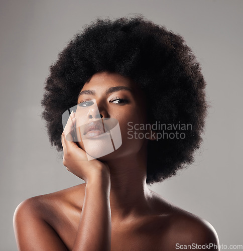 Image of Black woman, portrait and face, natural beauty and afro hair with dermatology and glow on studio background. African female model, cosmetic care and healthy skin, facial and shine with skincare