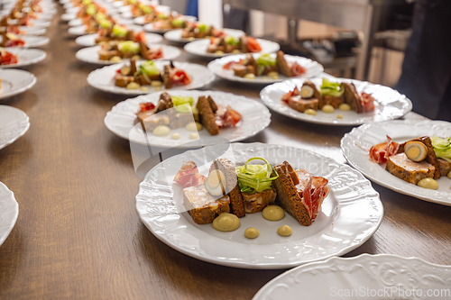 Image of Multiple plates of beautifully presented food