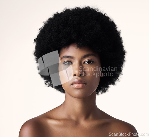 Image of Beauty, skin care and portrait of black woman with afro, cosmetics and dermatology on white background. Natural skincare, studio and African model with serious face, salon makeup glow and wellness.