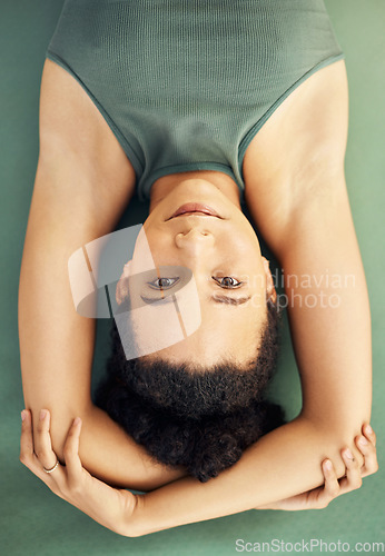 Image of Happy woman, yoga and lying on mat for exercise, stretching body or workout above at home. Top view portrait of female person, face or yogi in warm up or pose for spiritual wellness or awareness