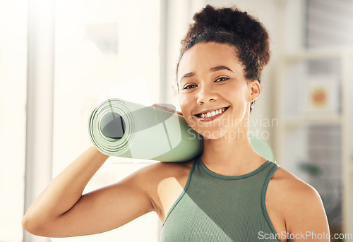 Image of Happy woman, portrait and yoga with mat for zen workout, exercise or spiritual wellness in living room at home. Calm female person or yogi with smile for healthy body, fitness or peaceful training