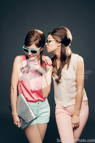 Image of Fashion, vintage and secret with women and whisper in studio for elegant, pastel and beauty. Sunglasses, confident and cosmetics with female model on dark background for glamour, beehive and style