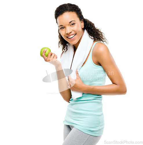 Image of Portrait, woman and apple in studio, white background and isolated for fitness, nutrition and detox diet for weightloss. Happy african female model eating healthy fruits for wellness after exercise