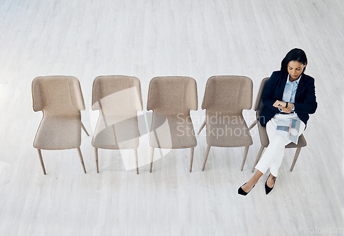 Image of Business woman, checking watch and waiting room sitting on chairs above on mockup space at office. Top view of female person or employee for job interview in schedule meeting, time or appointment