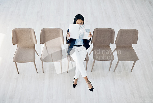 Image of Business woman, waiting room and reading on chairs for interview, hiring or recruitment at office. Portrait of female person or employee sitting for appointment, meeting or career opportunity in line