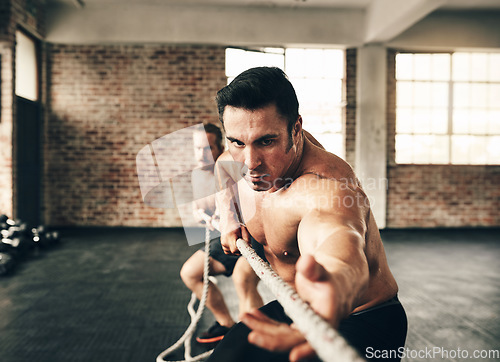 Image of Men, gym and pull rope with training for strong muscle, coaching or teamwork for health, fitness and together. Bodybuilder partnership, friends and tug of war for workout, action or support on floor