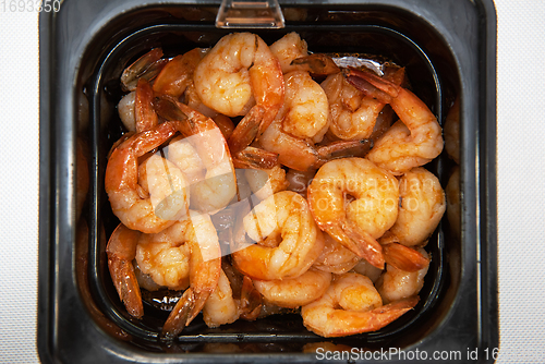 Image of Pickled shrimp in plastic container