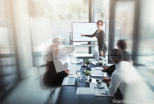Image of Presentation, businesswoman or speaker in a meeting for graphs report or chart analysis in a company. Motion blur, manager or mentor planning sales growth on screen monitor in training or coaching