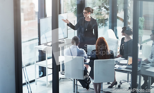 Image of Coaching, monitor or business people in presentation for sales report, vision or data analysis in training. Leadership, businesswoman teaching or manager planning strategy on screen in group meeting