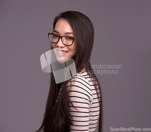Image of Fashion glasses, portrait and woman smile in studio isolated on a gray background mockup space. Face, nerd and female geek, person or model from Canada with trendy clothes, eyewear and casual style.