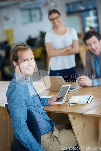 Image of Teamwork, portrait or happy programmers in meeting for discussion or brainstorming together in office. Diversity, digital or web developers networking with technology, tablet or laptop in workplace