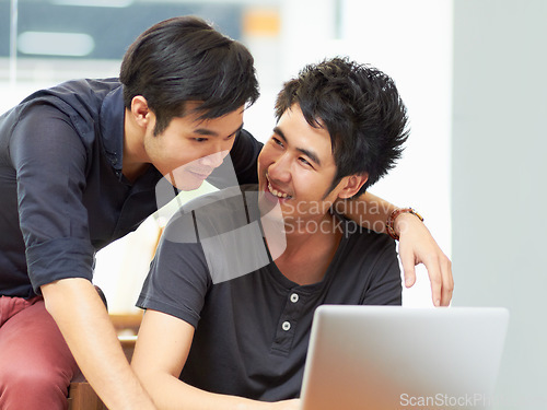 Image of Teamwork, gay couple working with laptop and at their home together happy. Collaboration or partnership, cheerful or happiness and bisexual people with computer for social networking or connectivity