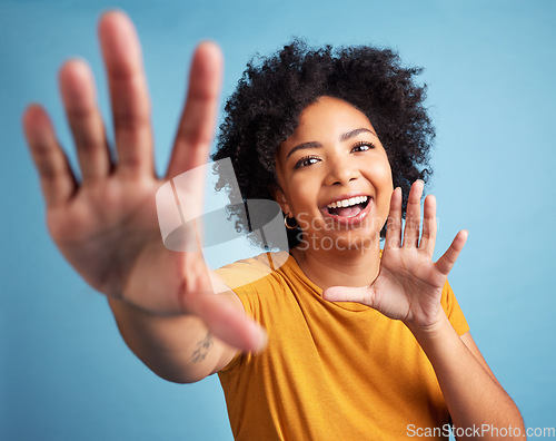 Image of Black woman, portrait and dance on studio blue background with happy, confidence in college, university with casual style. Girl, smile and excited dancing for fashion, promotion or announcement