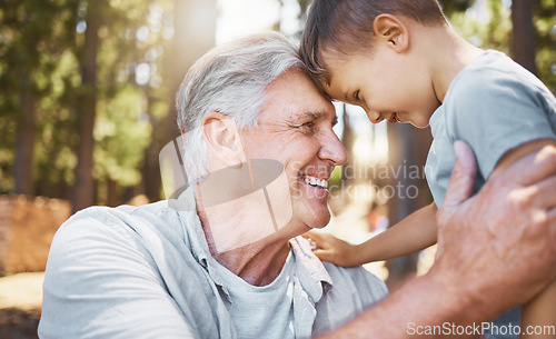 Image of Family, hiking or camping with a boy and grandfather bonding outdoor in nature together while on an adventure. Spring, travel and face of a senior man with his grandson closeup in the forest or woods