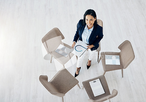 Image of Business woman, meeting and empty waiting room with documents on chair above in team appointment at office. Top view of female person or employee with paperwork in hiring or social group at workplace