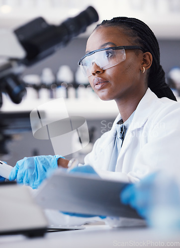 Image of Computer, black woman or scientist reading research for online analysis, sustainability or innovation. Science, studying biotechnology or African ecology expert in a laboratory for agro development