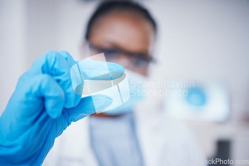 Image of Laboratory, woman or hand of scientist with little sign for research, assessment or experiment innovation. Healthcare, blur or biologist with small scale gesture for future development or results