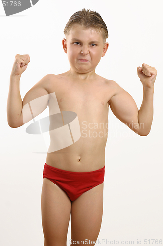 Image of Skinny boy flexing biceps