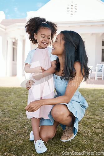 Image of Mother, smile and hug girl outdoor at home backyard, bonding and having fun. Happy, daughter and mom embrace with child for love, care for kid and enjoying quality time together on holiday vacation.